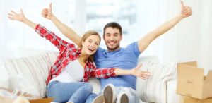 couple celebrate being in their new home