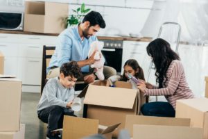 Family unpack belongings