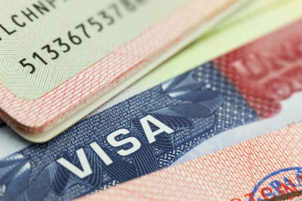 USA visa in a passport - travel background