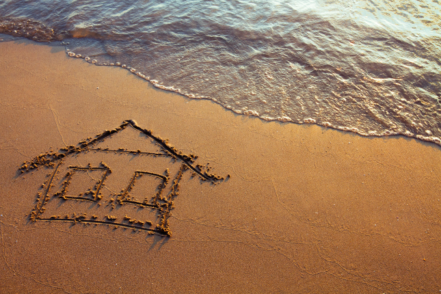 House drawn in sand