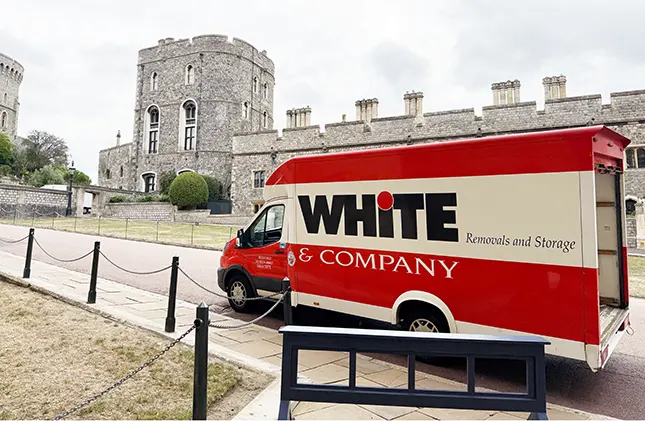 Crews adapted to the serene chapel surroundings, maintaining respect and care while manoeuvring items into the four-storey home.
